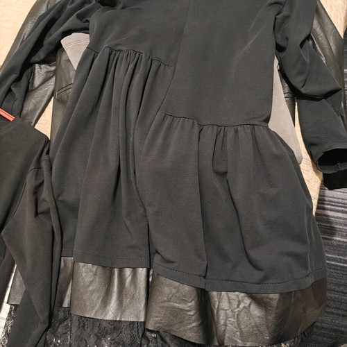 Black dress used with leatherette and lace details
