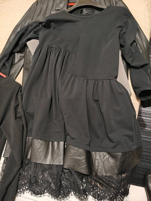 Black dress used with leatherette and lace details
