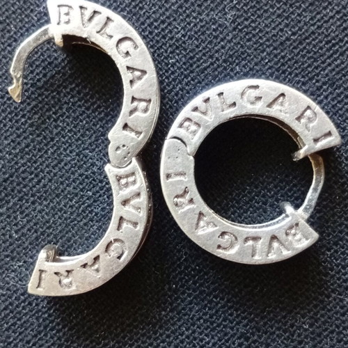 Silver earrings used with stones