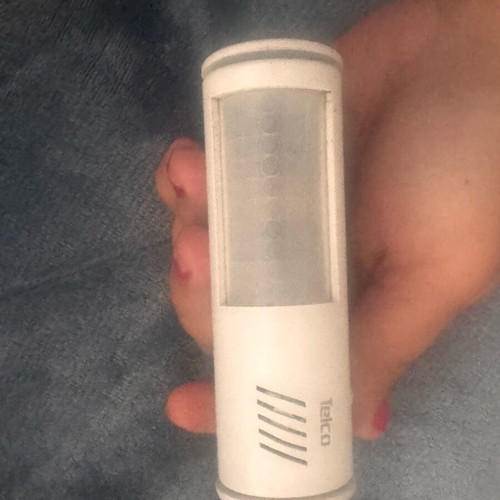 Motion sensor like new with alarm and square battery