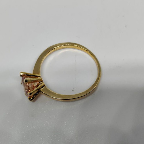 Ring with yellow gold finish and champagne stone, like new