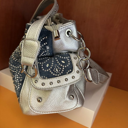 Shoulder bag silver, like new, bought abroad