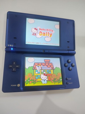Nintendo DSi handheld console with Pokemon HeartGold game