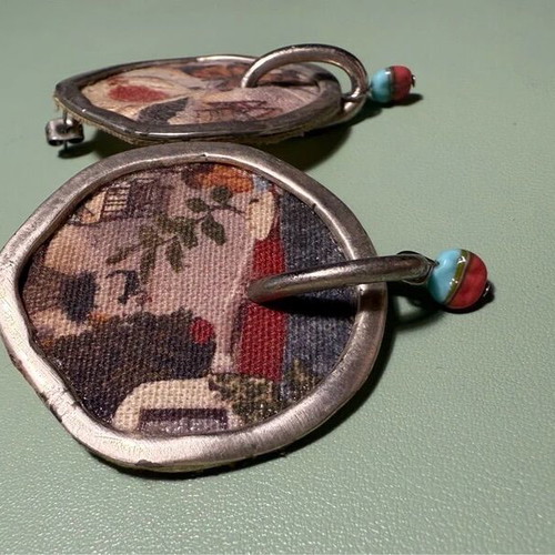 Handmade earrings used with canvas, metal and stones