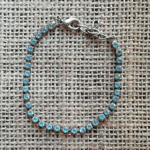 Steel bracelet new silver color decorated with blue zircon