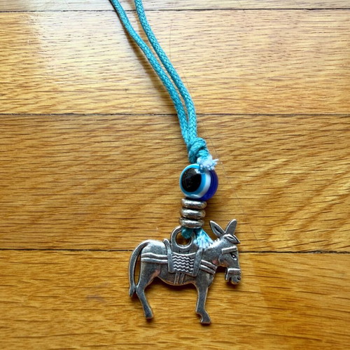 Donkey keychain like new with silver motif and blue eye bead