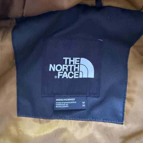 The North Face Millerton jacket like new, windproof, waterproof, black and gold