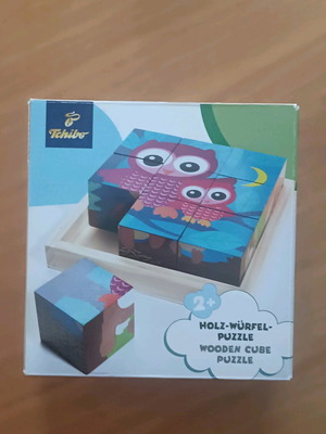 Wooden puzzle like new with 9 cubes and 6 animal images