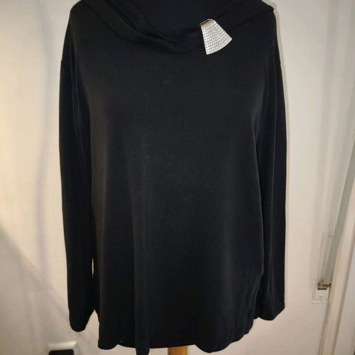 Women's black blouse used with metal decorative element on shoulder, size XL