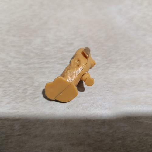 Dog figure used from old Zaini surprise eggs, missing one arm