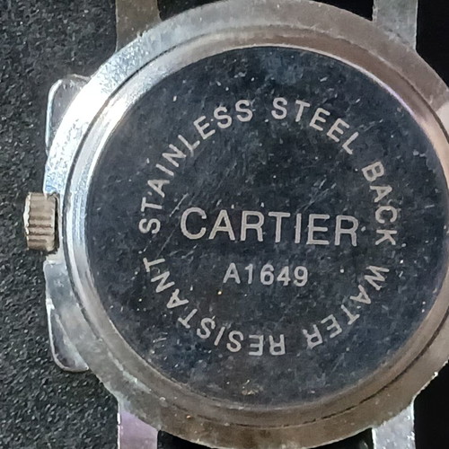 Cartier watch used, black leather strap
