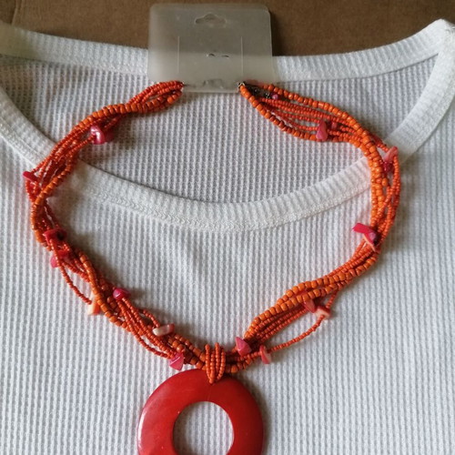 Necklace new with orange shell and beads