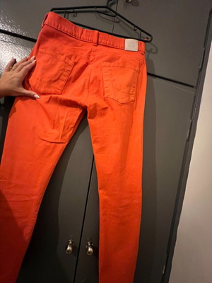 Orange pants like new made of Italian fabric