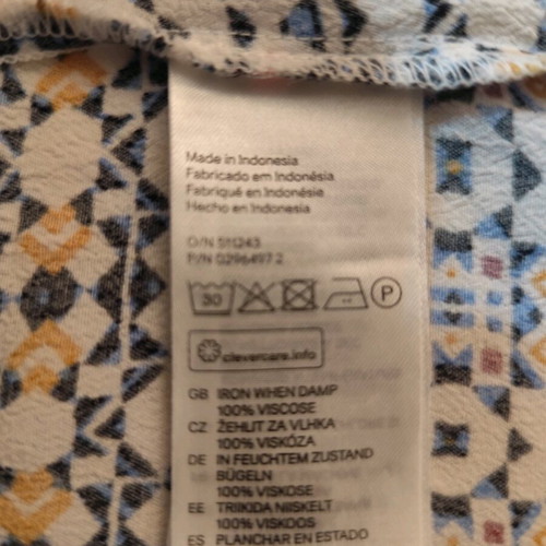 H&M blouse used with geometric ethnic pattern, viscose, short sleeve