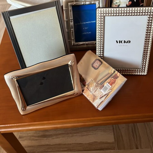 Set of 4 photo frames and 1 small album
