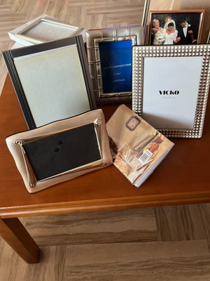 Set of 4 photo frames and 1 small album