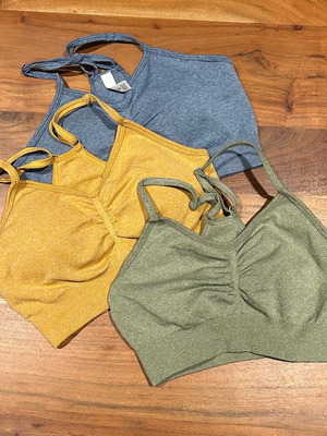 Sports tops new, pack of 3, two with padding, size S