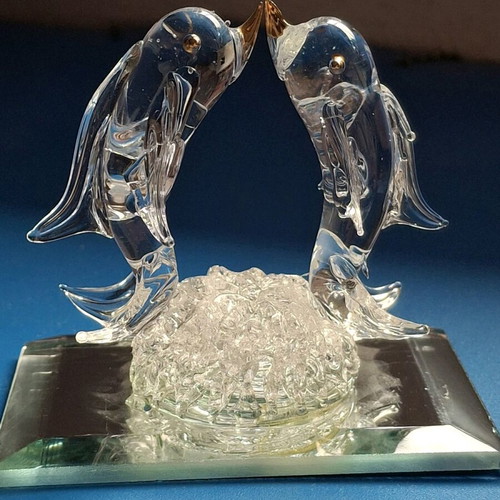 Glass figurines dolphin and duck used, mirror base