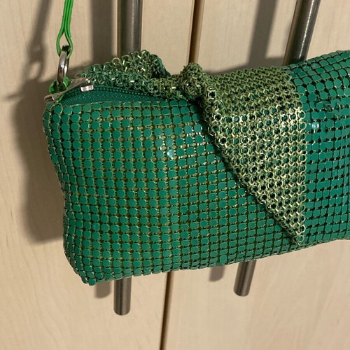 Migato green hand bag like new, satin interior