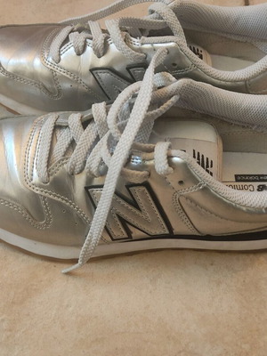 New Balance silver athletic shoes used, size 39
