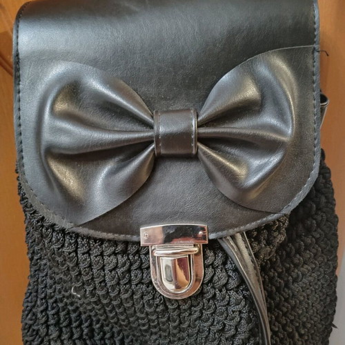 Knitted bag used black backpack