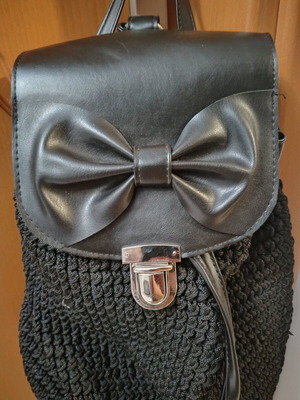 Knitted bag used black backpack