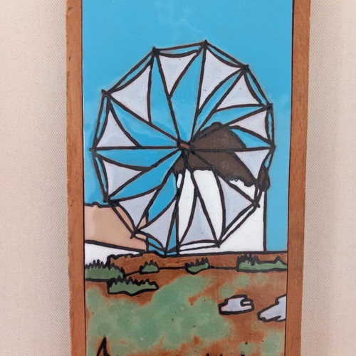 Windmill painting on ceramic tile used, with wooden frame