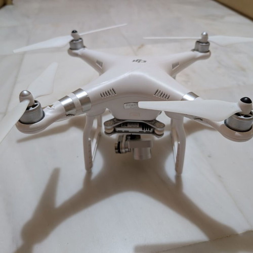 DJI Phantom 3 Advanced drone used with RC, new battery, hardshell case, and propellers