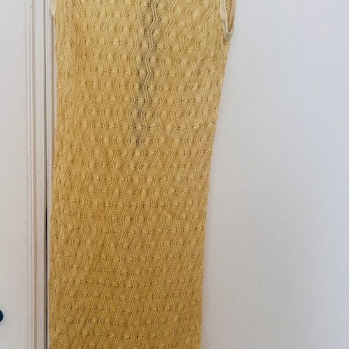 Yellow sleeveless knitted dress like new with geometric pattern and white trims
