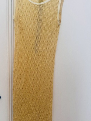 Yellow sleeveless knitted dress like new with geometric pattern and white trims