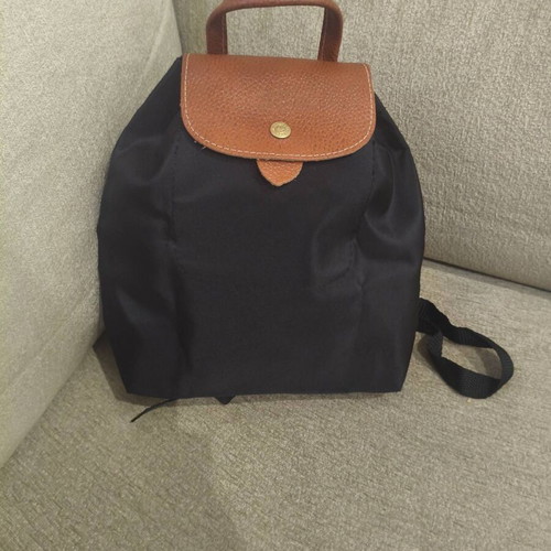 Foldable backpack like new, black with brown details