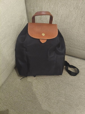 Foldable backpack like new, black with brown details