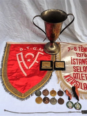 Sports medals, cup, banners and silver pendant identity card