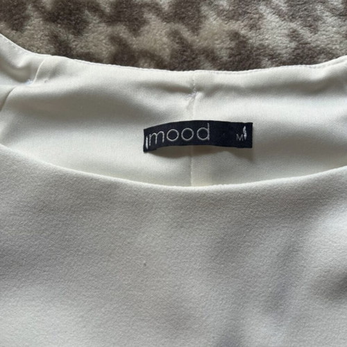 White top like new with cutouts and gold buttons size M