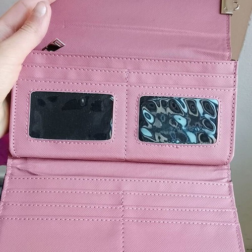 Pink wallet like new made of faux leather