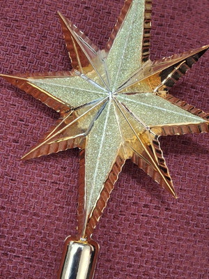 Embossed gold-tone Christmas tree star topper