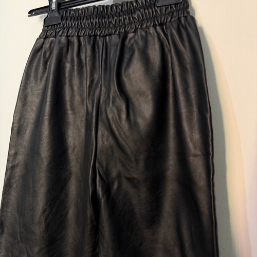 Women's black leather balloon or jogger pants used, with elastic waist and cuffs