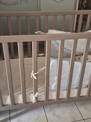 Ikea crib used with mattress and 4 bedding sets