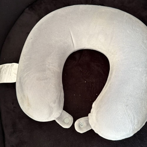 Travel pillow like new, gray color