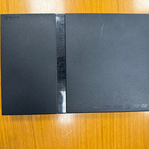 Sony PS 2 portable console used with cables and remote