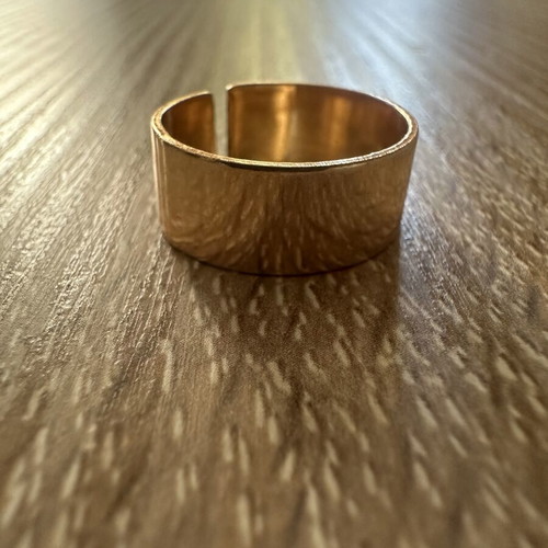 Wide gold-colored adjustable band ring, new