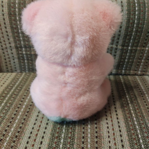 Teddy bear used with bell, pastel colors, 90s decade