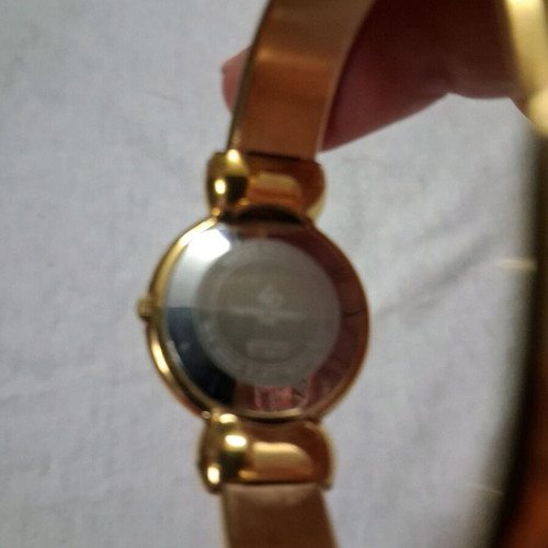 Laurent Dodane women's watch like new, gold color