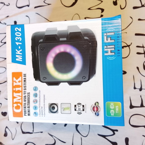 Mini Bluetooth Speaker like new with flashlight colors and karaoke