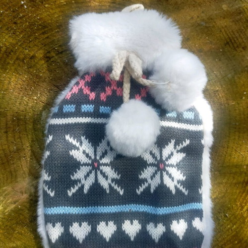 Winter hat used with fluffy pom-poms