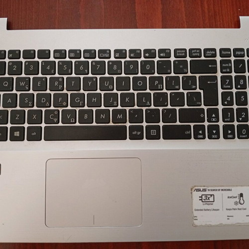 Asus X555Q laptop keyboard with touchpad used