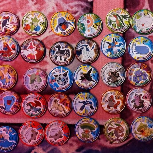 Pokémon advanced metal tazos set 42 metal tazos + 1 Megaman metal tazos like new
