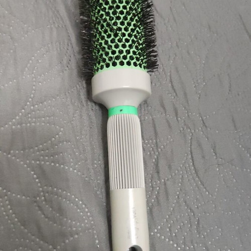Professional hairbrush used for straightening