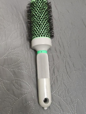 Professional hairbrush used for straightening