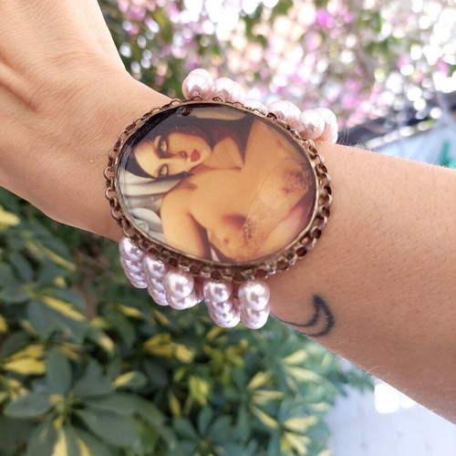 Handmade bracelet with bronze centerpiece and silver chain, new
